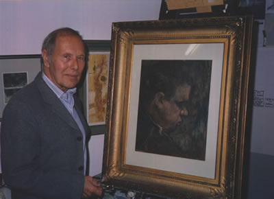 Gordon Stuart with his 1953 Painting of Thomas (Stuart was the last artist for whom Thomas sat)
